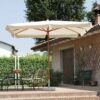 Ombrellone quadrato MOIA 3x3m in poliestere ecrù con volante antivento e fusto in legno teak