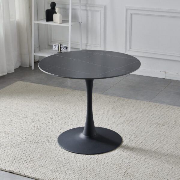 Tavolo rotondo Dot con piano in ceramica effetto marmo nero opaco con particolari oro e gamba nera